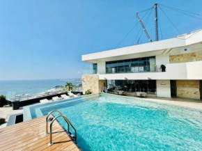 Elegante departamento frente al mar en zona dorada